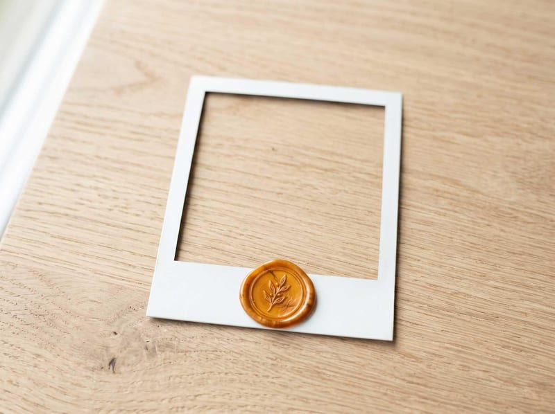 Polaroid frame with an amber wax seal, a reviewed transformation example marker.